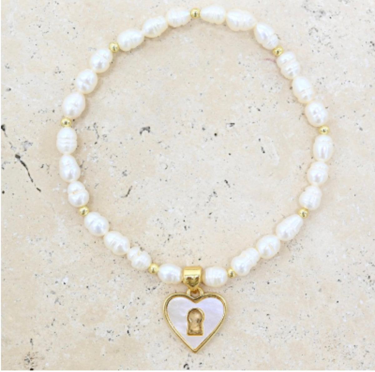 GOLD AND PEARL BRACELET WITH LOCK