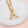 GOLD OCEAN CHARM NECKLACE